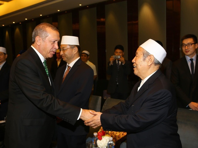 أردوغان يلتقي مسؤول الجالية المسلمة في الصين (غيتي)
