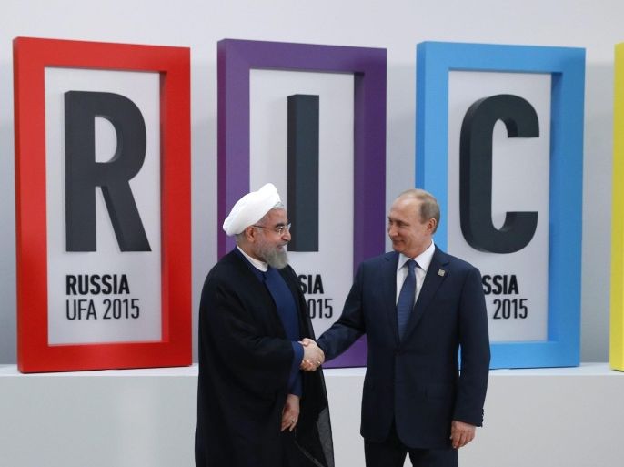 Russian President Vladimir Putin (R) welcomes Iranian President Hassan Rouhani at the BRICS Summit in Ufa, the capital of Bashkortostan republic, Russia, 09 July 2015. Ufa is hosting BRICS (Brazil, Russia, India, China and South Africa) and SCO (Shanghai Cooperation Organisation) summits on 09 and 10 July.