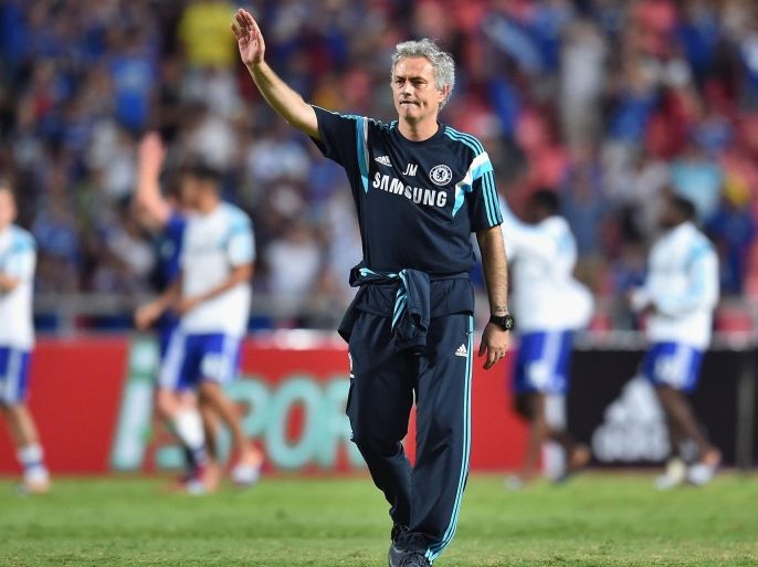 BANGKOK, THAILAND - MAY 30: Jose Mourinho team manager of Chelsea FC acknowledges the fan during the international friendly match between Thailand All-Stars and Chelsea FC at Rajamangala Stadium on May 30, 2015 in Bangkok, Thailand.