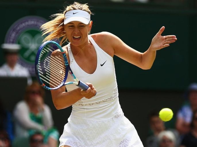 LONDON, ENGLAND - JULY 07: Maria Sharapova of Russia plays a forehand in her Ladies Singles Quarter Final match against Coco Vandeweghe of the United States during day eight of the Wimbledon Lawn Tennis Championships at the All England Lawn Tennis and Croquet Club on July 7, 2015 in London, England.