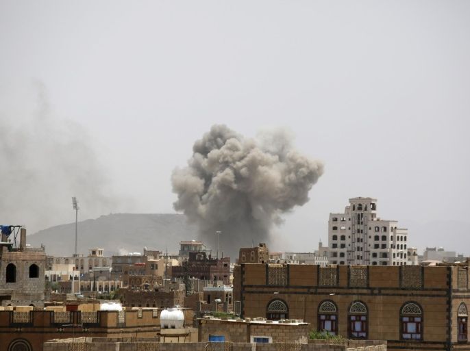 Smoke rises after an airstrike by the Saudi-led coalition in Sanaa, Yemen, Tuesday, July 14, 2015. The coalition has been targeting the Iran-allied Houthis since March in a bid to stop their power grab across the country. Yemeni forces battling the Shiite rebels in the country's south said they took control on Tuesday of the airport in the strategic port city of Aden. (AP Photo/Hani Mohammed)