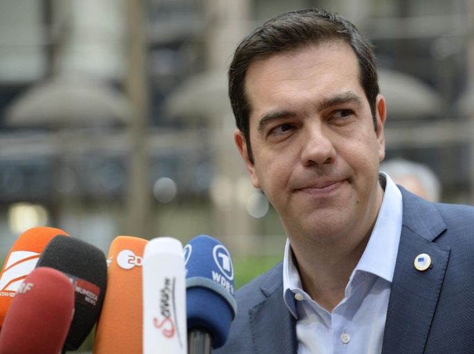 Greek Prime Minister Alexis Tsipras arrives for a meeting of the leaders of the 19 countries that use the euro, in Brussels on July 12, 2015. The EU cancelled a full 28-nation summittoday to decide whether Greece stays in the European single currency as a divided eurozone struggled to reach a reform-for-bailout deal. AFP PHOTO / THIERRY CHARLIER