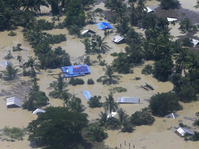 An aerial photograph showing flooded buildings in Kale township of Sagaing Region, Myanmar, 02 August 2015. Myanmar president declared four regions (Sagaing, Magway Regions and Rakhine, Chin States) as disaster zones on 31 July 2015. Heavy monsoon rains caused floods around Myanmar with dozens deaths being reported as thousands are fleeing their homes in several regions across the country. In Myanmar monsoon starts at the beginning of June and ends in September.