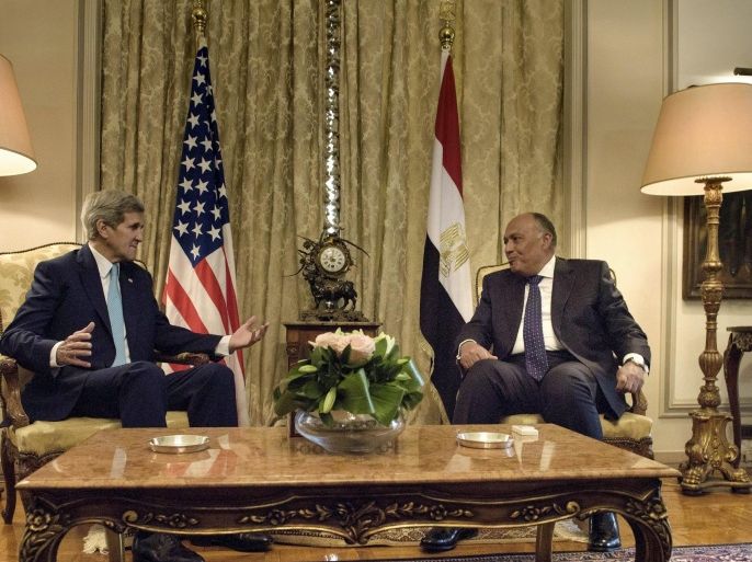U.S. Secretary of State John Kerry (L) and Egyptian Foreign Minister Sameh Shukri talk before a meeting at the Ministry of Foreign Affairs on August 2, 2015 in Cairo. REUTERS/Brendan Smialowski/Pool
