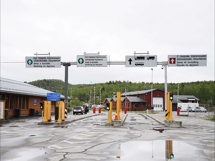 This June 6, 2013 picture show Storskog Boris Gleb border crossing between Norway and Russia near the Norwegian town of Kirkenes in the far north of the country. A group of intrepid Syrian migrants have found a new, albeit long, way into Europe -- through Russia and into Norway's Arctic, some of them cycling across the border. AFP PHOTO / Cornelius Poppe / NTB scanpix --NORWAY OUT--