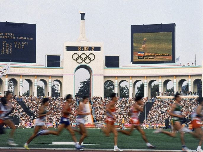 FILE - In this August 1984 file photo, competitors run in the men's 5,000 meters at the Olympic Games in Los Angeles. After a hastily called board meeting Wednesday, Aug. 12, 2015, U.S. Olympic Committee CEO Scott Blackmun said he was optimistic the committee could work out a plan to make Los Angeles, which hosted summer Olympics in 1932 and 1984, the U.S. bidder for the 2024 games. He hoped the decision would be official by the end of the month. ((AP Photo/File)