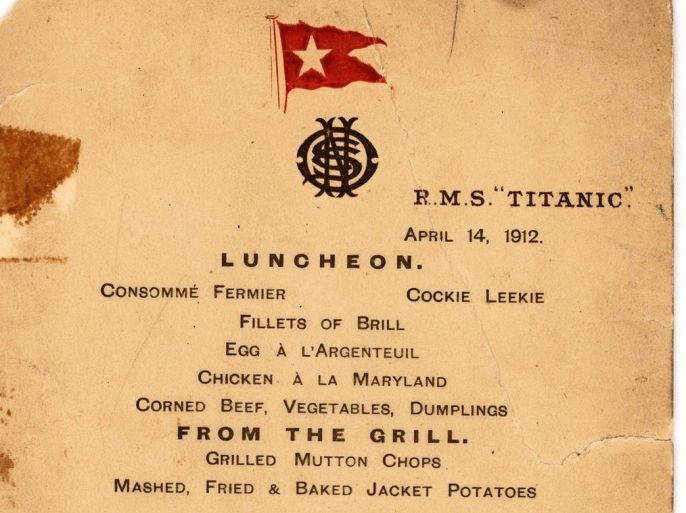 This undated photo provided by Lion Heart Autographs shows the Titanic’s last lunch menu, which is going to auction and is estimated to bring $50,000 to $70,000. The menu - saved by a passenger who climbed aboard the so-called “Money Boat” before the ocean liner went down - will be sold by Lion Heart Autographs, an online New York auctioneer, along with two other previously unknown artifacts from Lifeboat 1 on Sept. 30, 2015. The auction marks the 30th anniversary of the wreckage’s discovery at the bottom of the Atlantic Ocean. (Lion Heart Autographs via AP)