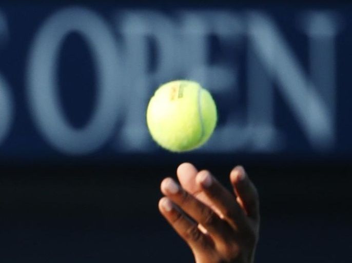 Frances Tiafoe, of the United States, tosses his serve against Viktor Troicki, of Serbia, during the first round of the U.S. Open tennis tournament, Tuesday, Sept. 1, 2015, in New York. (AP Photo/Julio Cortez)