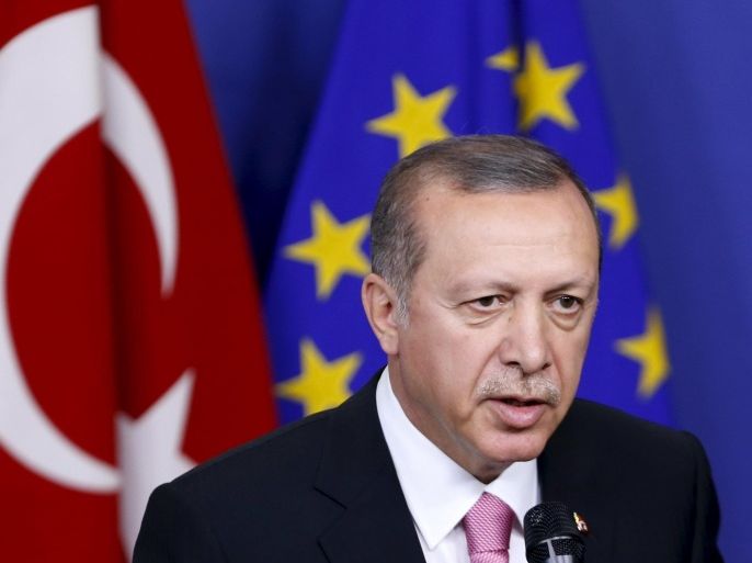 Turkey's President Tayyip Erdogan talks to the media before a meeting with European Commission President Jean-Claude Juncker (not pictured) at the EU Commission headquarters in Brussels, Belgium, October 5, 2015. Erdogan mocked European Union overtures for help with its migration crisis during a long-awaited visit to Brussels on Monday that in the end was partly overshadowed by Russia's violation of Turkish airspace near Syria. REUTERS/Francois Lenoir