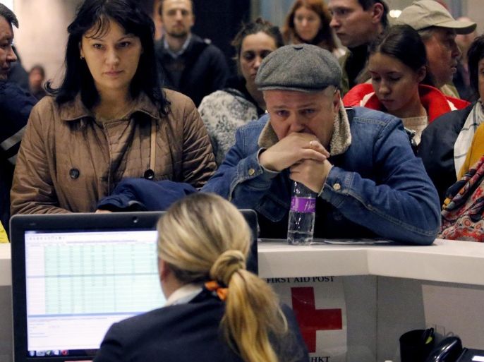 Relatives of passengers of MetroJet Airbus A321 stand at an informstion desk at Pulkovo II international airport in St. Petersburg, Russia, 31 October 2015. A Russian plane which went missing in Egypt on 31 October 2015 with 224 aboard has crashed in the Sinai, the Egyptian Civil Aviation Ministry confirmed. The ministry said in a statement that the debris from the plane had been found near the al-Arish airport, in the Sinai Peninsula. The plane was on a flight to St Petersburg, in Russia, reported the Itar-Tass news agency.