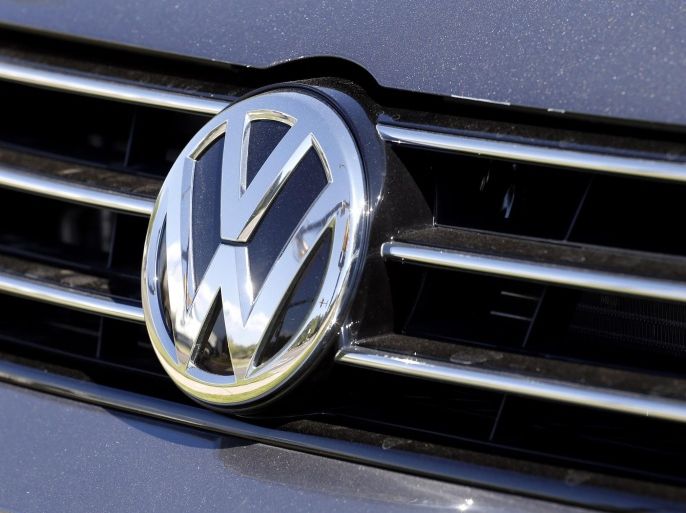 FILE - In this Sept. 24, 2015, file photo, the grille of a Volkswagen car for sale is decorated with the iconic company symbol in Boulder, Colo. Volkswagen said Monday, Oct. 12, 2015, it is recalling 1,950 diesel vehicles in China while Singapore announced it is suspending sales of the company’s diesel cars in the wake of the German automaker’s emissions cheating scandal. (AP Photo/Brennan Linsley,File)