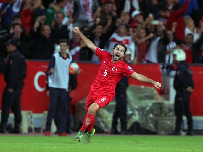 Turkey's Selcuk Inan celebrates his last minute goal during their Euro 2016 Group A qualifying match between Turkey and Iceland at the Buyuksehir Torku Arena Stadium in Konya, Turkey, Tuesday, Oct. 13, 2015.(AP Photo)