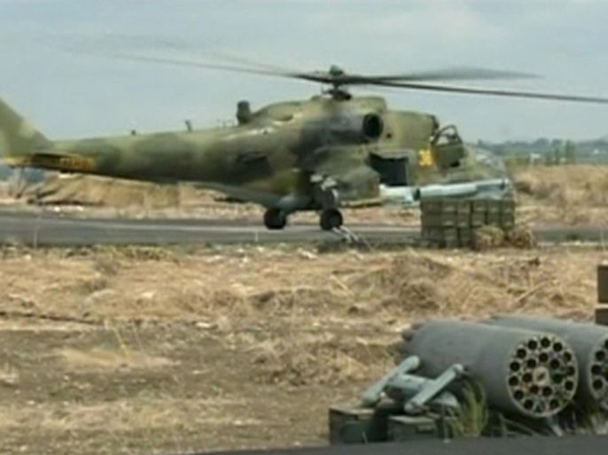 A still image taken from a October 6, 2015 footage shows a Russian air force helicopter on the tarmac of Heymim air base near the Syrian port town of Latakia. The Syrian army and allied militia carried out ground attacks on insurgent positions in Syria on Wednesday backed by Russian air strikes, in what appeared to be their first major coordinated assault since Moscow intervened last week, a monitor said. REUTERS/RURTR via Reuters TV ATTENTION EDITORS - THIS IMAGE HAS BEEN SUPPLIED BY A THIRD PARTY. IT IS DISTRIBUTED, EXACTLY AS RECEIVED BY REUTERS, AS A SERVICE TO CLIENTS. REUTERS IS UNABLE TO INDEPENDENTLY VERIFY THE AUTHENTICITY, CONTENT, LOCATION OR DATE OF THIS IMAGE. FOR EDITORIAL USE ONLY. NOT FOR SALE FOR MARKETING OR ADVERTISING CAMPAIGNS. NO SALES. NO ARCHIVES. RUSSIA OUT. NO COMMERCIAL OR EDITORIAL SALES IN RUSSIA.