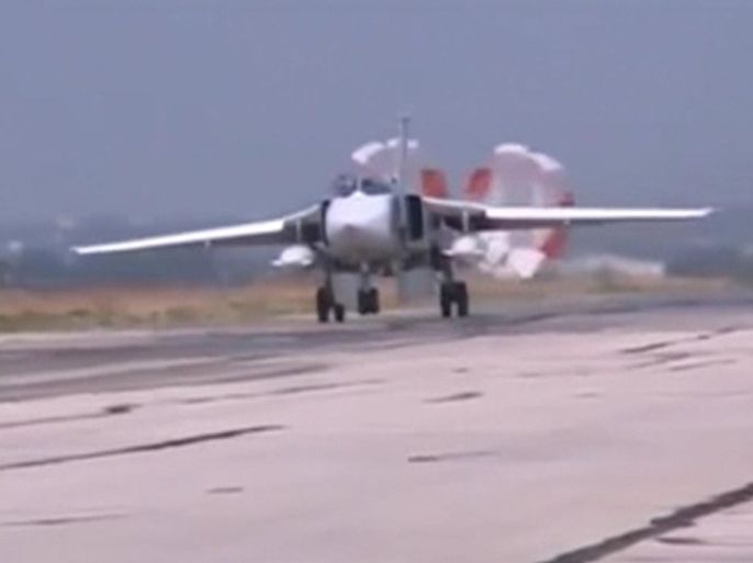 An image from video footage released by Russia's Defence Ministry October 5, 2015 shows a Russian air force Su-24 military jet slowing down after a sortie, at Heymim air base in Syria. More than 40 Syrian insurgent groups including the powerful Islamist faction Ahrar al-Sham have called on regional states to forge an alliance against Russia and Iran in Syria, accusing Moscow of occupying the country and targeting civilians. REUTERS/Ministry of Defence of the Russian Federation/Handout via Reuters ATTENTION EDITORS - FOR EDITORIAL USE ONLY. NOT FOR SALE FOR MARKETING OR ADVERTISING CAMPAIGNS. THIS IMAGE HAS BEEN SUPPLIED BY A THIRD PARTY. IT IS DISTRIBUTED, EXACTLY AS RECEIVED BY REUTERS, AS A SERVICE TO CLIENTS. REUTERS IS UNABLE TO INDEPENDENTLY VERIFY THE AUTHENTICITY, CONTENT, LOCATION OR DATE OF THIS IMAGE. FOR EDITORIAL USE ONLY. NOT FOR SALE FOR MARKETING OR ADVERTISING CAMPAIGNS. NO SALES.