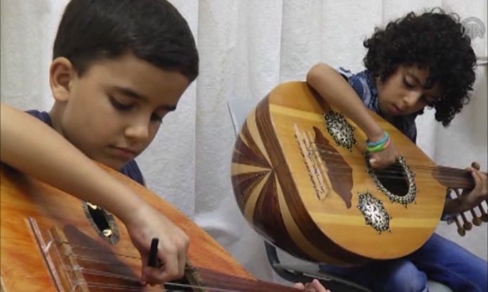 أطفال غزة يداوون آثار الحرب بإيقاعات موسيقية