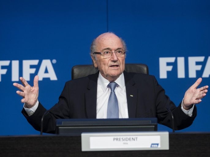 FILE - In this July 20, 2015 file photo FIFA president Sepp Blatter speaks during a news conference at the FIFA headquarters in Zurich. (Ennio Leanza/Keystone via AP, file)