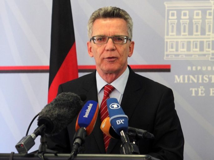 German Interior Minister Thomas de Maiziere speaks at a news conference after meeting with Albanian counterpart Saimir Tahiri, in Tirana, Friday, Nov. 6, 2015. De Maiziere calls on Albanians to stop asking for political asylum in Germany as there is no ground for their claims. (AP Photo/Hektor Pustina)