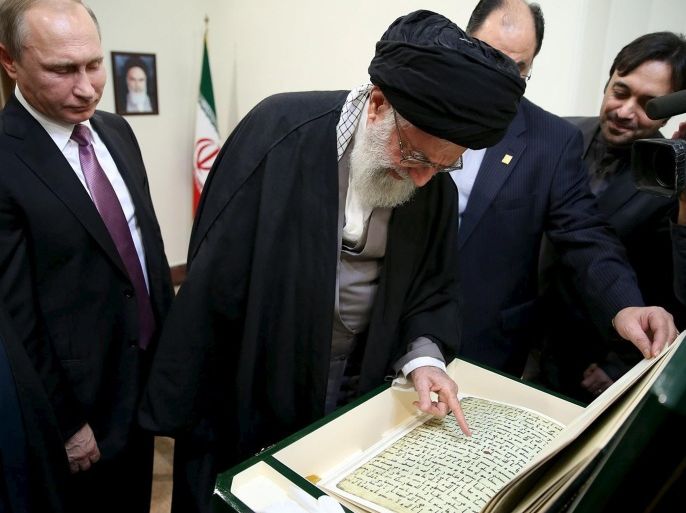 Iran's Supreme Leader Ayatollah Ali Khamenei (C) receives a gift from Russia's President Vladimir Putin (L) in Tehran November 23, 2015. REUTERS/leader.ir/Handout via ReutersATTENTION EDITORS - THIS PICTURE WAS PROVIDED BY A THIRD PARTY. REUTERS IS UNABLE TO INDEPENDENTLY VERIFY THE AUTHENTICITY, CONTENT, LOCATION OR DATE OF THIS IMAGE. EDITORIAL USE ONLY. NOT FOR SALE FOR MARKETING OR ADVERTISING CAMPAIGNS. NO RESALES. NO ARCHIVE. THIS PICTURE IS DISTRIBUTED EXACTLY AS RECEIVED BY REUTERS, AS A SERVICE TO CLIENTS.
