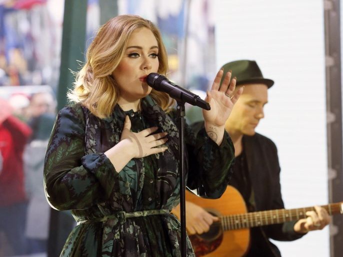 In this image released by NBC, Adele performs on the "Today" show on Wednesday, Nov. 25, 2015, to promote her latest release, "25." (Heidi Gutman/NBC via AP)