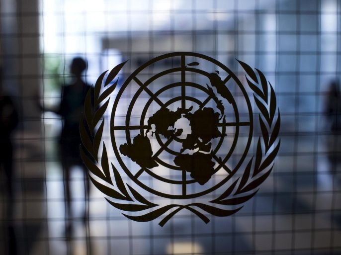 A United Nations logo is seen on a glass door in the Assembly Building at the United Nations headquarters in New York City September 18, 2015. As leaders from almost 200 nations gather for the annual general assembly at the United Nations, the world body created 70 years ago, Reuters photographer Mike Segar documented quieter moments at the famed 18-acre headquarters on Manhattan's East Side. The U.N., established as the successor to the failed League of Nations after World War Two to prevent a similar conflict from occurring again, attracts more than a million visitors every year to its iconic New York site. The marathon of speeches and meetings this year will address issues from the migrant crisis in Europe to climate change and the fight against terrorism. REUTERS/Mike SegarPICTURE 13 OF 30 FOR WIDER IMAGE STORY "INSIDE THE UNITED NATIONS HEADQUARTERS"SEARCH "INSIDE UN" FOR ALL IMAGES