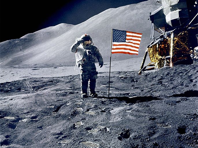 الموسوعة - Astronaut David Scott salutes flag during Apollo 15 mission. - source: getty images