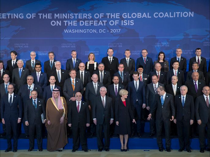 epa05863897 The family photo of the Meeting of the Ministers of the Global Coalition on the Defeat of the so-called 'Islamic State' (also known as IS or ISIS), at the State Department in Washington, DC, USA, 22 March 2017. Sixty-eight nations are participating in the summit of the global coalition against ISIS, the first meeting of this size of the group since 2014. EPA/MICHAEL REYNOLDS