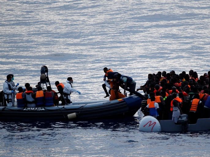 Migrants on a dinghy are rescued by Spanish frigate Canarias crew in the Mediterranean sea off Libya coast, June 17, 2017. REUTERS/Stefano Rellandini