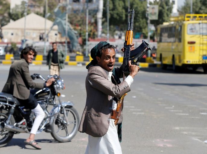 An armed Houthi follower reacts after attending a gathering celebrating Houthi advancement on forces loyal to Yemen's former president Ali Abdullah Saleh at Tahrir Square in Sanaa, Yemen December 3, 2017. REUTERS/Khaled Abdullah