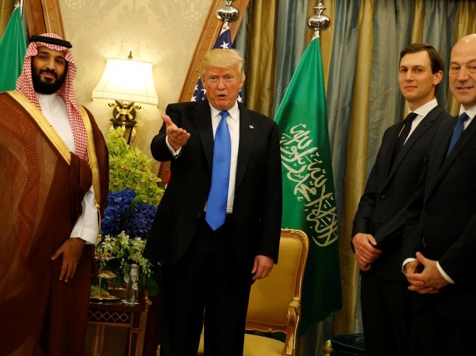 U.S. President Donald Trump, flanked by White House senior advisor Jared Kushner (2nd R) and chief economic advisor Gary Cohn (R), delivers remarks to reporters after meeting with Saudi Arabia's Deputy Crown Prince and Minister of Defense Mohammed bin Salman (L) at the Ritz Carlton Hotel in Riyadh, Saudi Arabia May 20, 2017. REUTERS/Jonathan Ernst