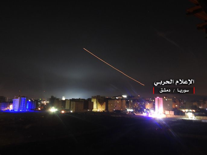 epa06724728 A handout photo made available by government-affiliated Syrian Military Media is said to show Syrian air defense missiles intercepting missile strikes over Damascus, Syria, 09 May 2018 (issued 10 May 2018). According to Syrian official media reports, the air defense was responding to a new wave of Israeli missile strikes. EPA-EFE/SYRIAN MILITARY MEDIA HANDOUT HANDOUT EDITORIAL USE ONLY/NO SALES