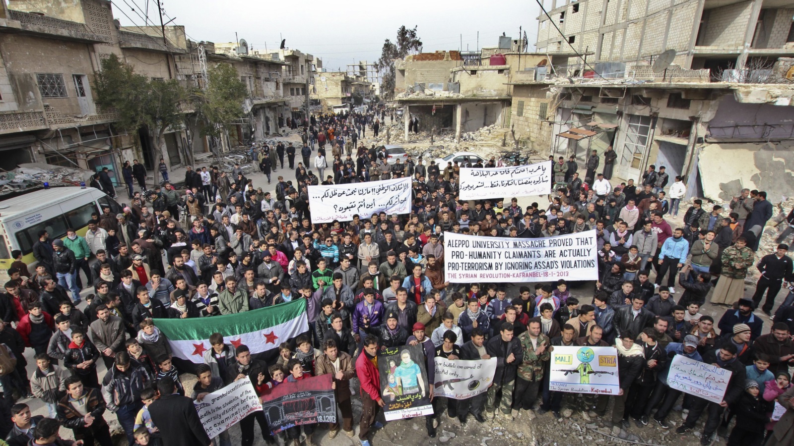 سوريون ضد صمت المجتمع الدولي إزاء جرائم الأسد