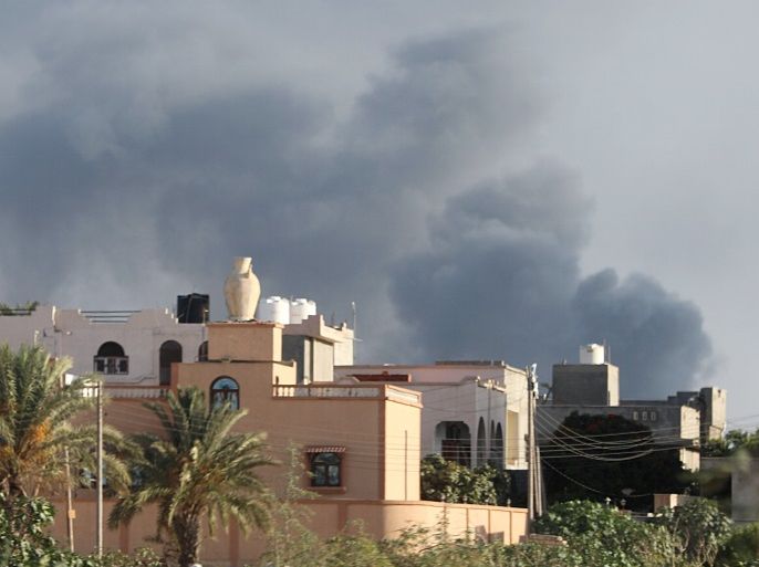 Smoke rises during heavy clashes between rival factions in Tripoli, Libya, August 28, 2018. Picture taken August 28, 2018. REUTERS/Hani Amara