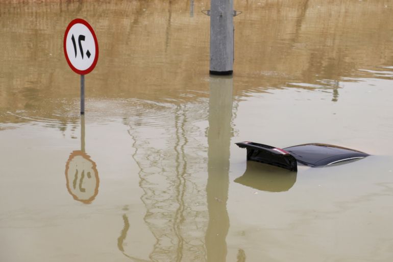 A car is seen submerged following heavy rain in Riyadh, Saudi Arabia November 25, 2015. REUTERS/Faisal Al Nasser