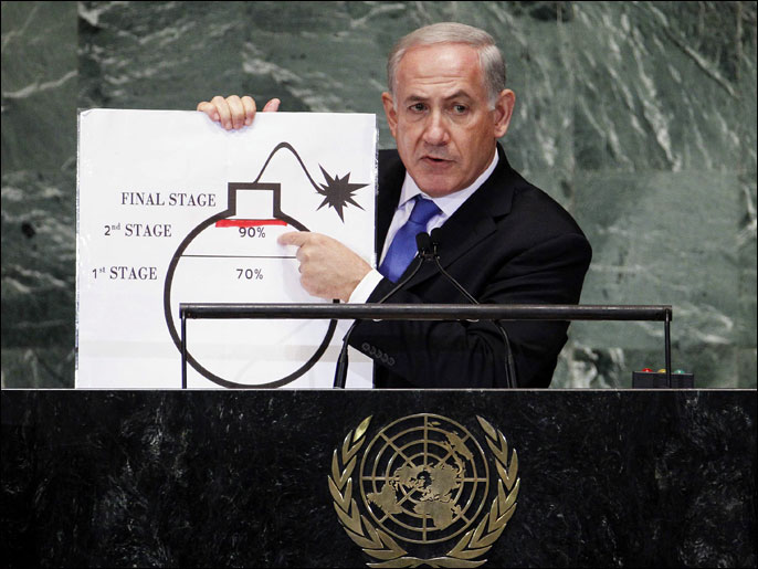 Israel's Prime Minister Benjamin Netanyahu points to a red line he has drawn on a graphic of a bomb used to represent Iran's nuclear programme as he addresses the 67th United Nations General Assembly at the U.N. Headquarters in New York in this September 27, 2012 file photo. The red line he drew represents a point where he believes, the international community should tell Iran that they will not be allowed to pass without intervention. To match Special Report IRAN-SANCTIONS/ REUTERS/Lucas Jackson/Files (UNITED STATES - Tags: POLITICS)