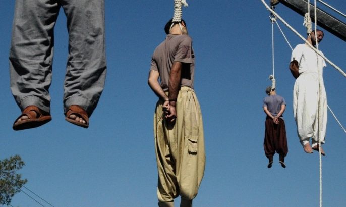 Four Iranian criminals are hanged in public in the southern city of Shiraz, 950 kms (590 miles) south of Tehran, 05 September 2007. Iran executed today 21 criminals in a single day, the latest of a growing number of executions in a crackdown which officials say is aimed at improving security in society.