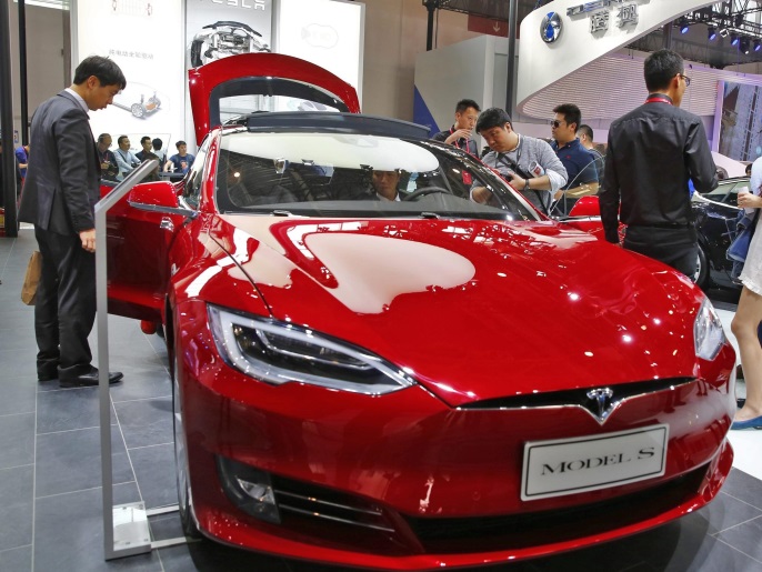 (FILE) A file picture dated 26 April 2016 shows a Tesla model S electric car on display at the Auto China 2016 motor show in Beijing, China. The carmaker in a blog post on 30 June 2016 revealed that the National Highway Transportation Safety Administration (NHTSA) on 29 June 2016 was opening a preliminary evaluation into a fatal crash of one of Tesla's Model S cars. The driver was killed on 07 May 2016 during a test drive in autopilot mode when a tractor trailer crashe