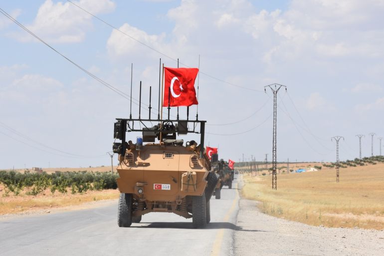 Turkish army completes third round of patrols in Manbij- - MANBIJ, SYRIA - JUNE 22: Armoured vehicles of Turkish Armed Forces patrolling in the northern Syrian city of Manbij on June 22, 2018. Turkish Armed Forces on Friday completed their third round of patrolling in the northern Syrian city of Manbij as part of a deal with the U.S. to rid the area of the YPG/PKK terror group.