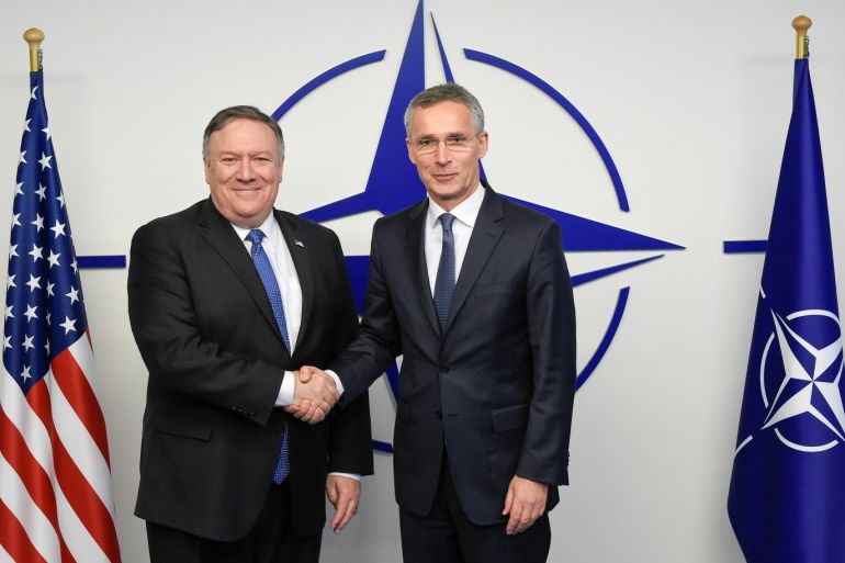 U.S. Secretary of State Mike Pompeo is welcomed by NATO Secretary General Jens Stoltenberg prior to a meeting at Alliance heaquarters in Brussels, Belgium December 4, 2108. John Thys/Pool via REUTERS