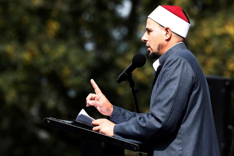 Imam Gamal Fouda leads a Friday prayer at Hagley Park outside Al-Noor mosque in Christchurch, New Zealand March 22, 2019. REUTERS/Edgar Su
