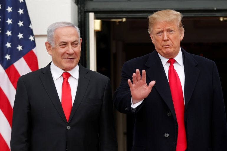U.S. President Donald Trump gestures to gathered news media as he welcomes Israel Prime Minister Benjamin Netanyahu at the White House in Washington, U.S., March 25, 2019. REUTERS/Carlos Barria