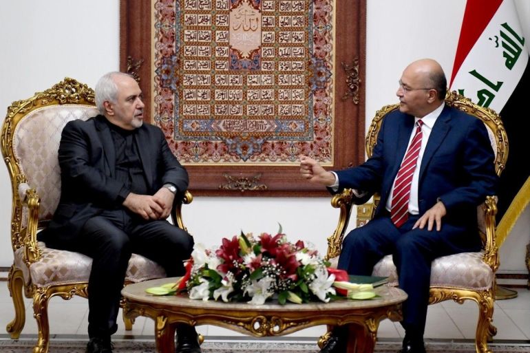 Iraq's President Barham Salih meets with Iranian Foreign Minsiter, Mohammad Javad Zarif, in Baghdad Iraq May 25, 2019. The Presidency of the Republic of Iraq Office/Handout via REUTERS ATTENTION EDITORS - THIS IMAGE WAS PROVIDED BY A THIRD PARTY.