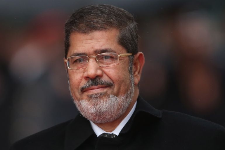 BERLIN, GERMANY - JANUARY 30: Egyptian President Mohamed Mursi arrives at the Chancellery to meet with German Chancellor Angela Merkel on January 30, 2013 in Berlin, Germany. Mursi has come to Berlin despite the ongoing violent protests in recent days in cities across Egypt that have left at least 50 people dead. Mursi is in Berlin to seek both political and financial support from Germany. (Photo by Sean Gallup/Getty Images)