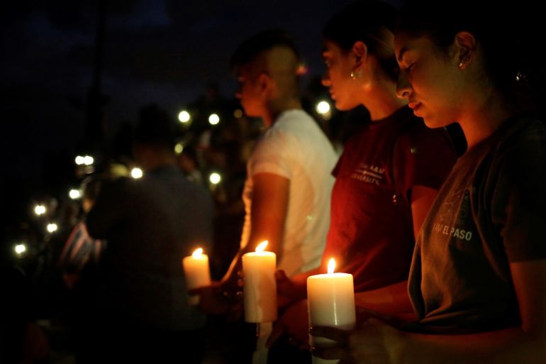 Mourners taking part in a vigil at El Paso High School after a mass shooting at a Walmart store in El Paso, Texas, U.S. August 3, 2019. REUTERS/Jose Luis Gonzalez