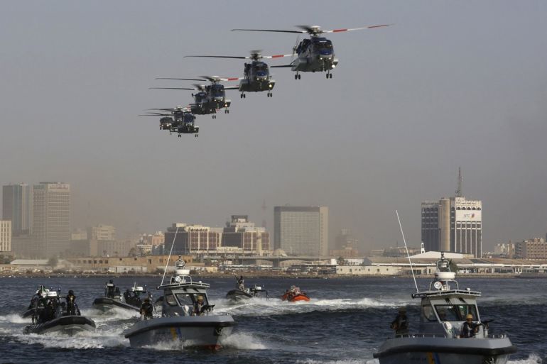 Helicopters and boats are seen during a military drill by members of the Saudi Security forces, in Jeddah City May 27, 2014. REUTERS/Mohamed Alhwaity (SAUDI ARABIA - Tags: MILITARY)