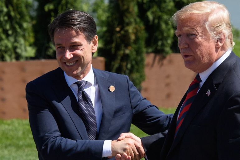 LA MALBAIE , QC - JUNE 08: Italy's Prime Minister Giuseppe Conte (L) shakes hands with the President of the United States Donald Trump on the first day of the G7 Summit, on 8 June, 2018 in La Malbaie, Canada. Canada will host the leaders of the UK, Italy, the US, France, Germany and Japan for the two day summit, in the town of La Malbaie. Leon Neal/Getty Images/AFP== FOR NEWSPAPERS, INTERNET, TELCOS & TELEVISION USE ONLY ==