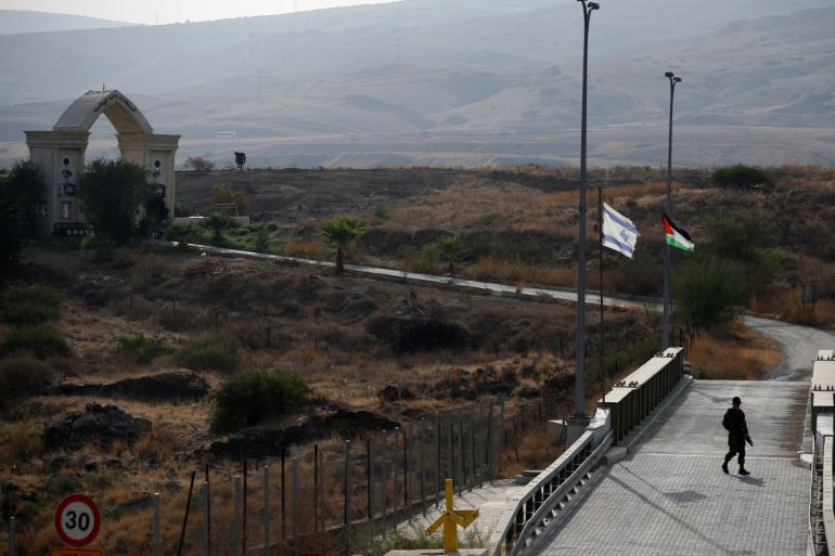 An Israeli soldier patrols the border area between Israel and Jordan at Naharayim, as seen from the Israeli side October 22, 2018. REUTERS/ Ronen Zvulun