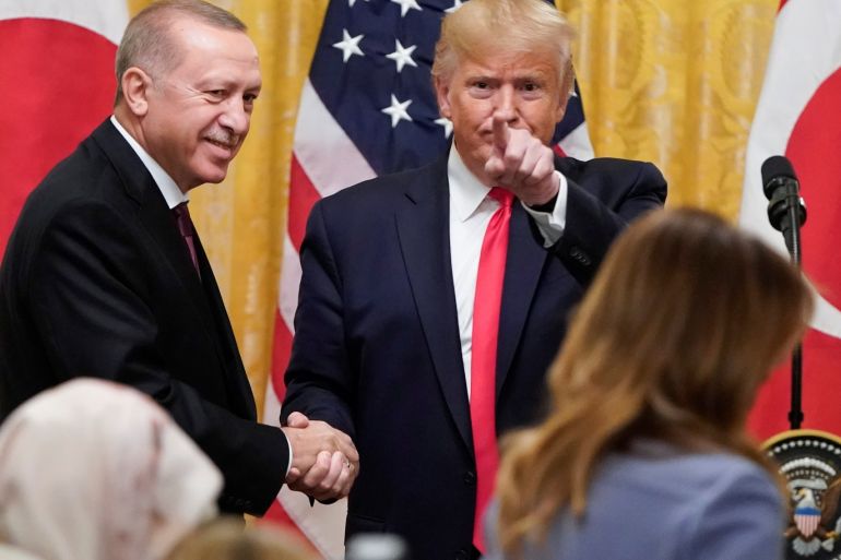 U.S. President Donald Trump greets Turkey's President Tayyip Erdogan after a joint news conference at the White House in Washington, U.S., November 13, 2019. REUTERS/Joshua Roberts