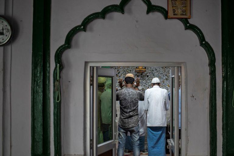 Muslims pray inside a mosque after Supreme Court's verdict on a disputed religious site, in Ayodhya, India, November 10, 2019. REUTERS/Danish Siddiqui