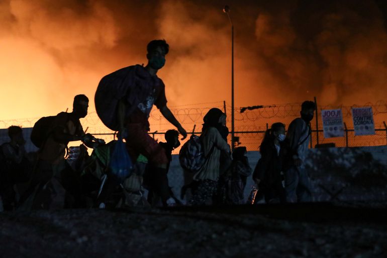 Fire burns at the Moria camp for refugees and migrants on the island of Lesbos