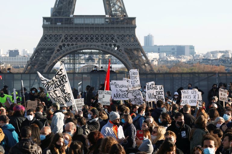 Protests in France over proposed curbs on identifying police, in Paris